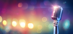 Retro Microphone On Stage With Bokeh Light
