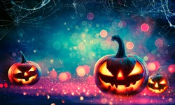 Halloween Abstract Party - Smiling Pumpkins On Defocused Shiny Background
