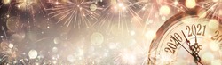Happy New Year 2021 - Abstract Defocused Background - Clock And Fireworks Waiting Midnight