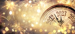 2023 New Year - Clock And Fireworks - Countdown To Midnight  - Abstract Defocused Background