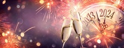 2024 New Year Celebration - Champagne And Clock For Countdown - Toast Cheering With Abstract Defocused Background