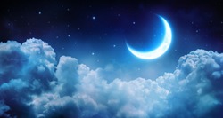 Romantic Moon In Starry Night Over Clouds
