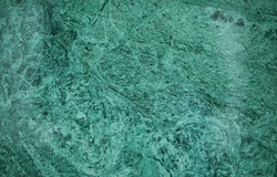 Beautiful green marble luxury decor wall with streaks.Green marble texture wall.Stone background texture.Stone pattern. Abstract background.  Green marble background. Green pattern.Decor for interior.