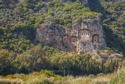 Rock tombs of the kings at ancient city of Kaunos, a UNESCO world heritage site at Dalyan, Mugla, Turkey.