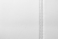 Texture of white leather, seam, close-up