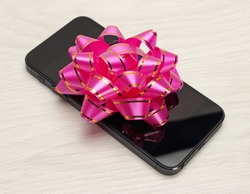 Gift for the holidays phone with a bow
