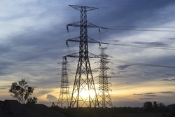 Transmission tower or power tower. Also called alternatively electricity pylon or variations. Including steel structure framing to support or carry powerline, cable, high-voltage transmission line.