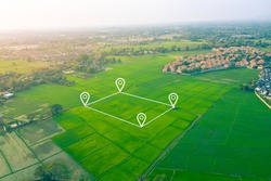 Land plot in aerial view. Include landscape, real estate, green field, agricultural plant, pin location icon. For housing subdivision, residential, development, owned, sale, rent, buy or investment.