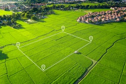 Land plot in aerial view. Identify registration symbol of vacant area for map. That property, real estate for business of home, house or residential i.e. development, sale, buy, purchase or investment