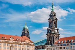 Herbstmarkt and Holy Cross Church bell and clock tower. Panoramic cityscape of beautiful modern Dresden. Historical, touristic and shopping center in downtown of Dresden, Germany