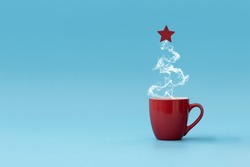 Christmas tree made of steaming coffee with red star. Morning drink. Christmas or New Year celebration concept. Copy space.
