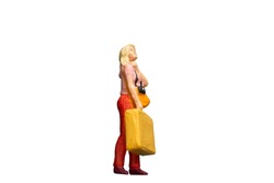Miniature people holding a luggage isolate on white background with clipping path