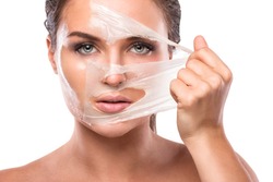 Young and beautiful woman with Purifying Mask on her face