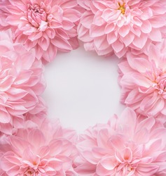 Creative pastel pink flowers frame, top view. Layout  or greeting card for Mothers day, wedding or happy event