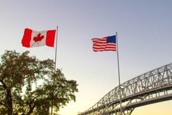 International Border Crossing. Sunset at the Blue Water Bridge border United States and Canada crossing. The bridge connects Port Huron, Michigan and Sarnia, Ontario.