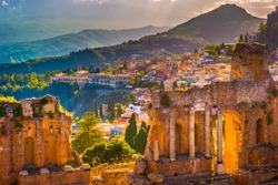 The Ruins of Taormina Theater at Sunset. Beautiful travel photo, colorful image of Sicily.