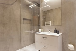 Modern Bathroom With Brown Tiles