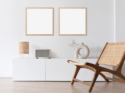 Two blank picture frame mockups on a wall. Square orientation. Artwork templates in interior design