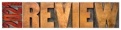 2021 review banner - annual review or summary of the recent year - isolated word abstract in letterpress wood type blocks, business and financial concept