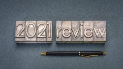 2021 review banner - annual review or summary of the recent year - word abstract in grunge letterpress metal type blocks, business and financial concept