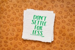 do not settle for less inspirational note, handwriting on a handmade paper, self respect, value and personal development concept