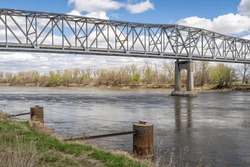 Brownville Bridge built in 1939  is a truss bridge over the Missouri River on U.S. Route 136  from Nemaha County, Nebraska, to Atchison County, Missouri, at Brownville, Nebraska, spring scenery