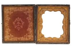 antique, worn out, clam shell photo case from nineteenth century tintype or daguerrotype portrait, red faded fabric and gold frame with floral ornaments, picture frame isolated with clipping path