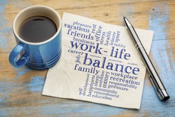 work life balance word cloud - handwriting on a napkin with a cup of coffee