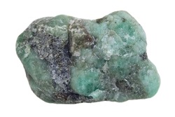 raw emerald gemstone (mineral beryl)  with inclusions mined in Brazil isolated on white