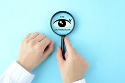 Eye clip art and magnifying glass and doctor's hand