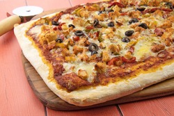 rectangular pizza with chicken and grilled peppers