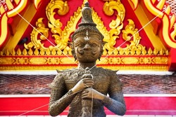 King Thao Wessuwan or Vasavana Kuvera giant statue for thai people travel visit respect praying holy deity mystery at Wat Phang Muang temple in Si Prachan of Suphanburi city in Suphan Buri, Thailand