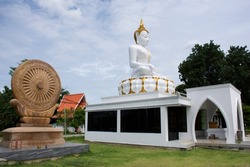 Beautiful white ancient buddha statue for thai people and foreign travelers travel visit and respect praying and blessing wish holy mystery worship at Wat khien or Khian temple in Nonthaburi, Thailand