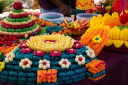 Colorful art handmade krathong or floating lantern basket craft for thai people into float at river for forgiveness from Goddess of water in Loy Krathong festival at Wat Sai Yai in Nonthaburi Thailand