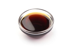 Dark caramel syrup, isolated on white background.