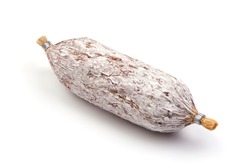 Cured salami with fennel seeds, Italian traditional sausage, isolated on white background.