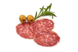 Cured salami with fennel seeds, Italian traditional sausage, isolated on white background.