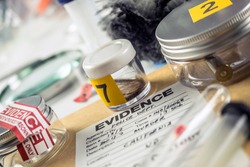 Police record along with some forensic evidence of murder at Laboratory forensic equipment, conceptual image