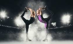 Biellmann spin. Couple figure skating in action. Sports banner. Horizontal copy space background