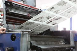 The printed machine does the newspaper