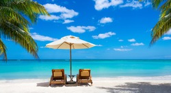 turquoise sea, deckchairs, white sand and palms, sun, very beautiful nature