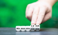 Symbol for the increase of the minimum wage (Mindestlohn in German) in Germany from 9,60 EUR to 12 EUR.