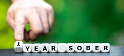 Dice form the expression '1 year sober'.