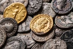A treasure of Roman gold and silver coins.Trajan Decius. AD 249-251. AV Aureus.Ancient coin of the Roman Empire.Authentic  silver denarius, antoninianus,aureus of ancient Rome.Antikvariat.