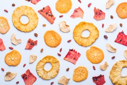 Healthy balanced food, clean eating, naturally flavoured snacks, transparent ingredients concept. Dried fruits, dehydrated persimmon, watermelon, pineapple, apple chips on a white background