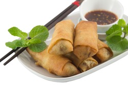 Close up of deep fried spring rolls on white background