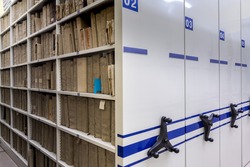 mobile shelves with documents. Archive or office, archive, file, registration