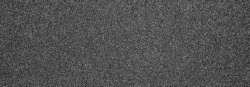 The texture of a dense gray carpet.Grey carpet background.