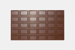 Milk chocolate bar, isolated on a white background top view.Milk chocolate divided into blocks top view.