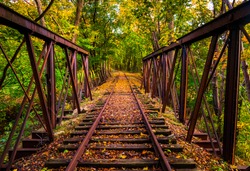 Railroad tracks covered in autumn leaves, near Stewartstown, Pennsylvania.